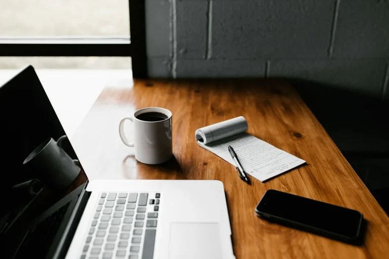 coffee cup and laptop